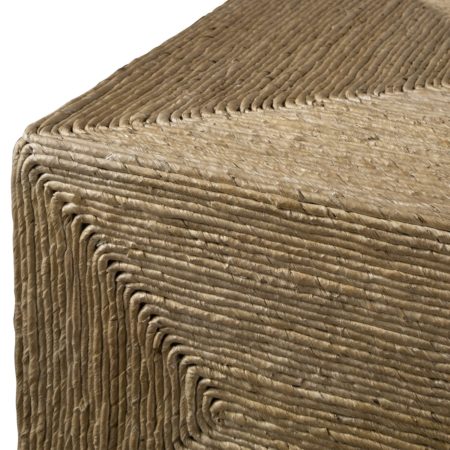 Raja Coffee Table Equal parts relaxed and refined, this coffee table embodies casual coastal style. Wrapped in natural woven banana plant, creating unique texture and concentric color patterns, resting on wooden feet finished in a light walnut stain. Dimensions: 48 W X 16 H X 28 D (in)